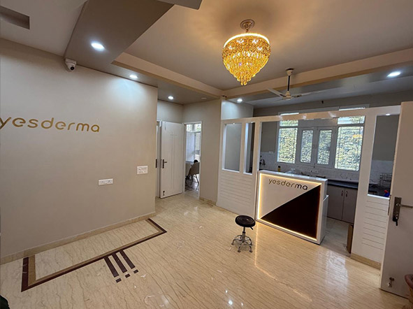 Dermatologist examining a patient's skin