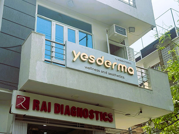 Dermatologist examining a patient's skin