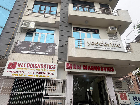 Dermatologist examining a patient's skin